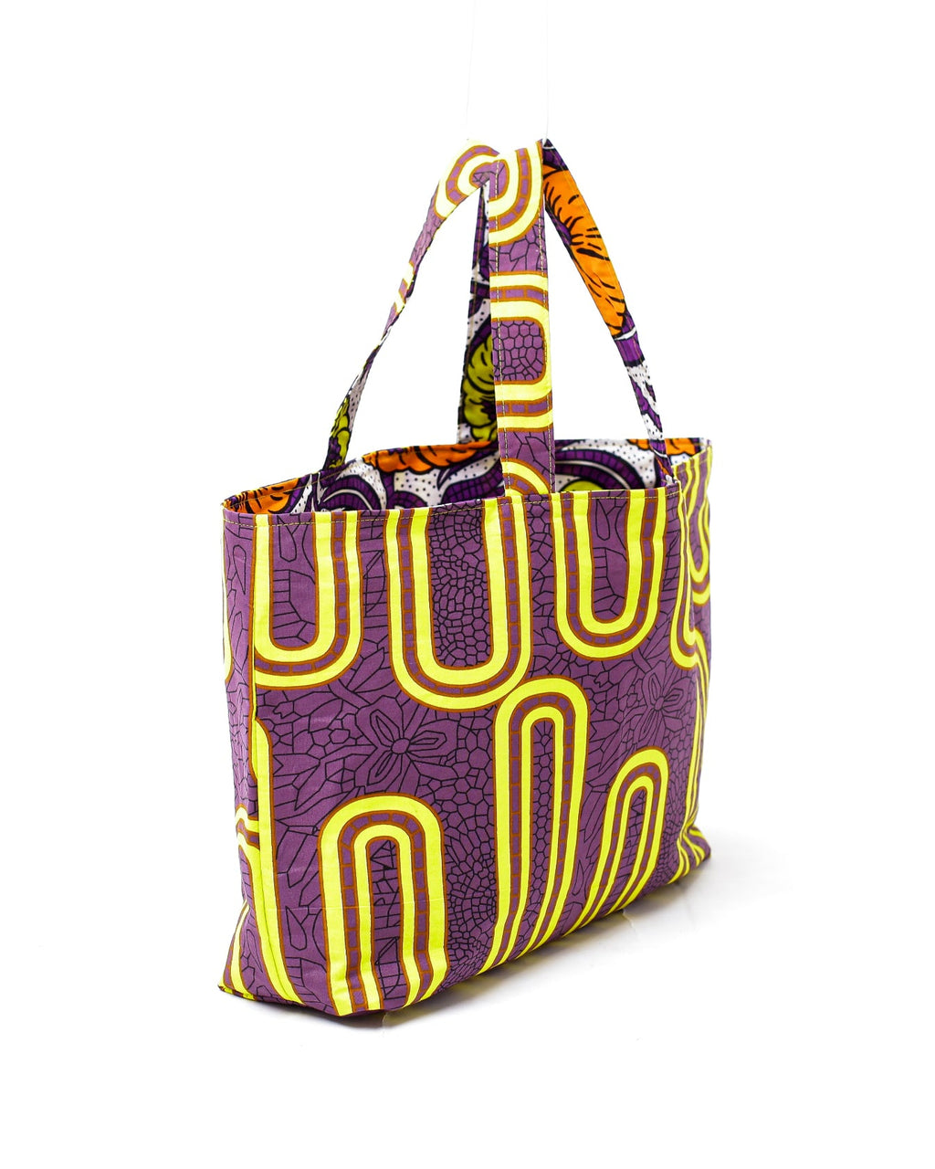 Tote bag Ruthi con tela africana lila visto de perfil
