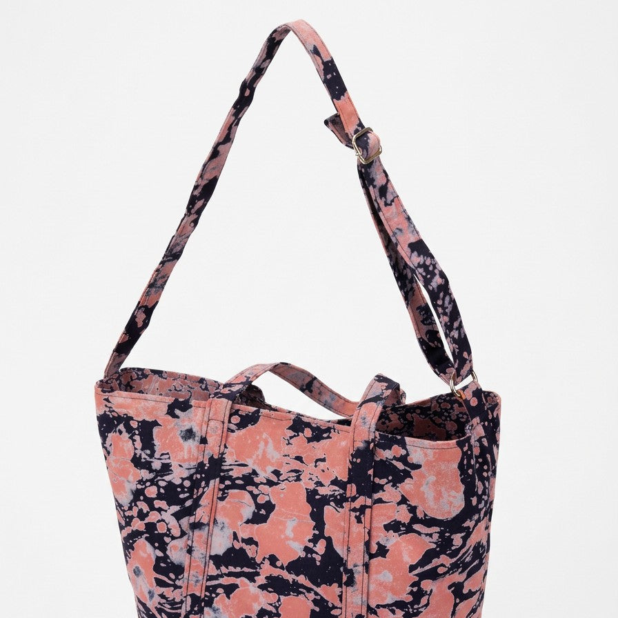 Detalle del asas del bolso tote nil de batik color rosa